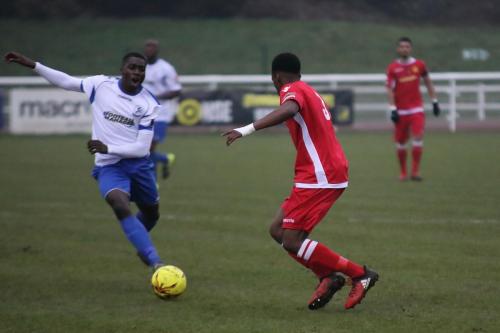 Enfields Percy Kiangebeni (L) and Mersthams Kristian Campbell