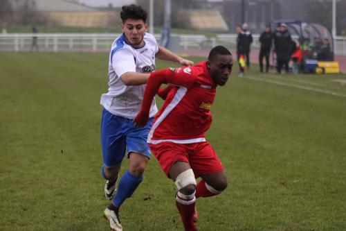 Enfields Samir Bihmoutine (L) and Mersthams Alex Addai