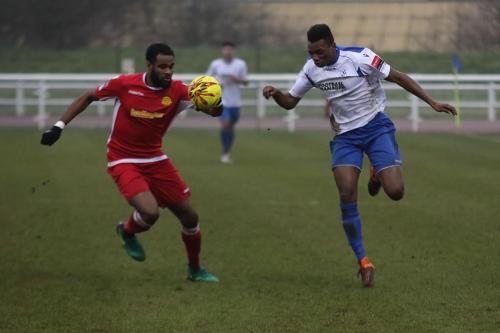Mersthams Marc Okoye (L) and Enfields Karl Oliyide