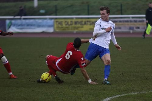 Mersthams Tutu Henriques (6) wins the ball from Mickey Parcel