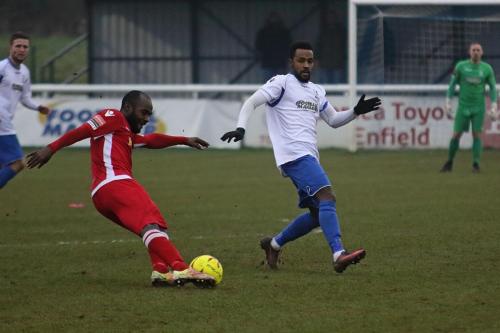 Mersthans Dean McDonald (L) and Enfields Bobby Devyne