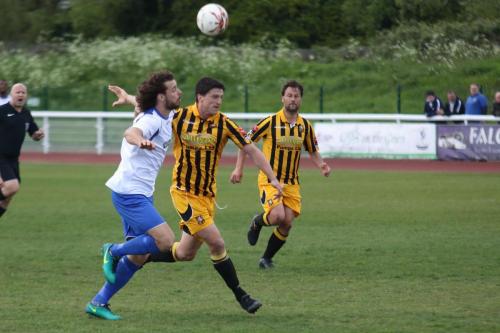 Enfields Harry Ottaway (L) and Fokestones Frankie Chappell and Jordan Wright