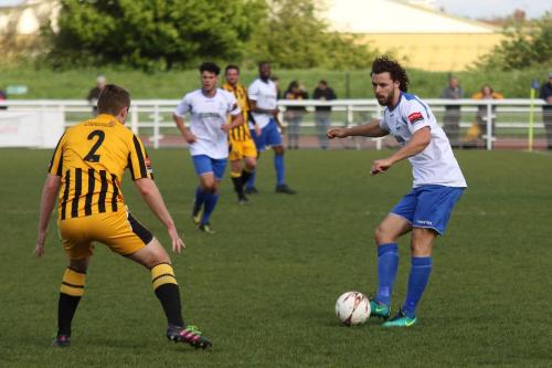 Enfields Harry Ottaway (R) and Folkestones Callum Davies