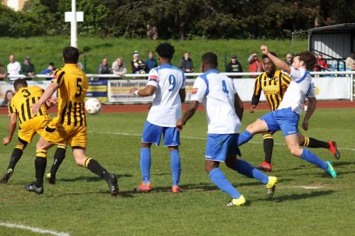 Enfields Harry Ottaway (R) shoots wide