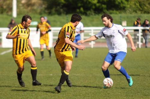 Enfields Harry Ottaway and Folkestones Jordan Wright (L) and Frankie Chappell