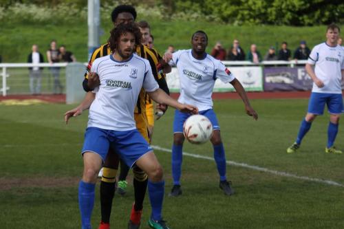 Enfields Harry Ottaway shields the ball from Nathan Ferguson
