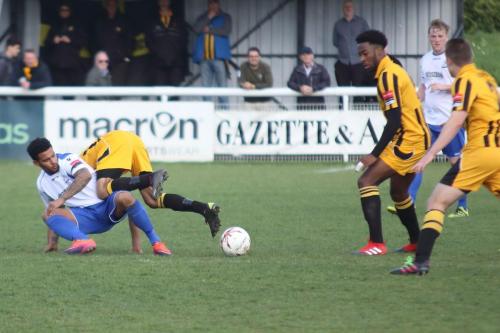Enfields Nathan Livings (L) wins a tackle against Nat Blanks