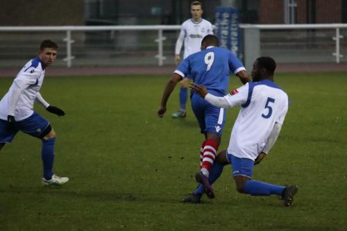 Enfields Hariold Joseph (5) tackles Reece Dobson