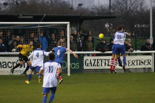 Enfields Harry Ottaway (10) challenges at a corner
