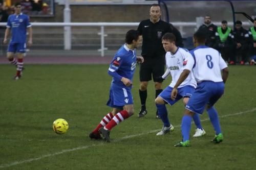 Enfields Jonathan Muleba (R) and Billy Crook and Needhams Jack Curtis