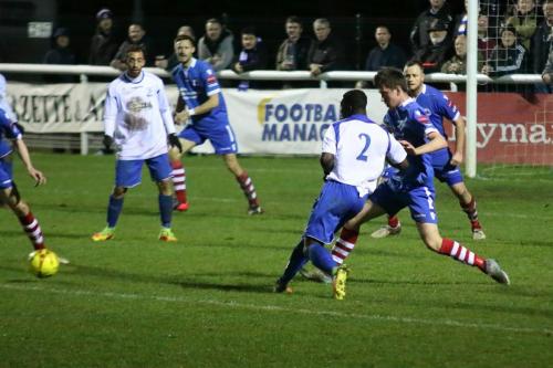 Enfields Percy Kiangebeni (2) plays the ball across the 18-yard line