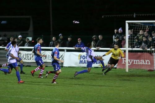 Enfields Ricky Gabriel stretches but cant reach the ball