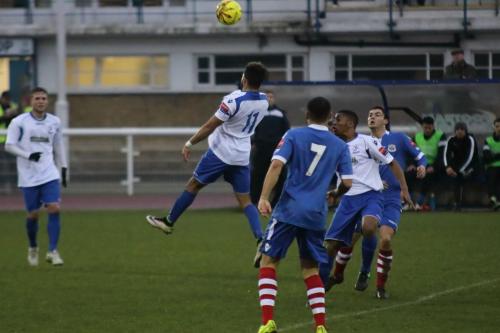 Enfields Tyler Campbell (11) heads the ball up rather than forwards