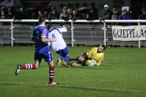 Needham keeper Danny Gay saves from Scott Shulton