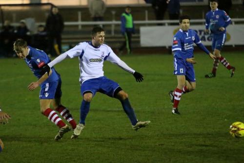 Needhams Callum Harrison (L) and Enfields Billy Crook