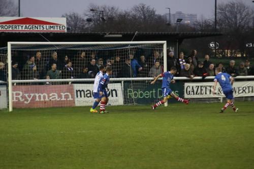 Needhams Ian Miller (2nd R) is beaten by Mickey Parcells shot to put Enfield 3-2 ahead