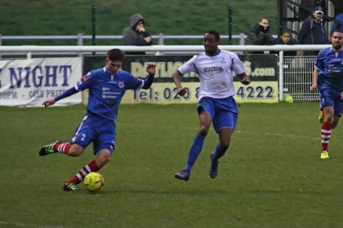 Needhams Jake Dye clears from Ricky Gabriel