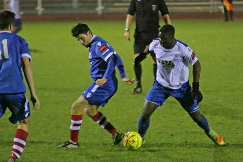 Needhams Kem Izzet (blue) and Enfields Percy Kiangebeni