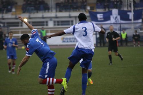 Needhams Luke Ingram (L) and Enfields Ricky Gabriel