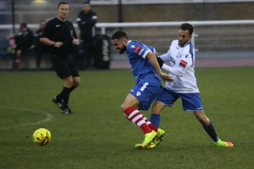 Needhams Luke Ingram (L) and Enfields Scott Shulton