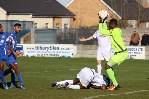 Enfields Ricky Gabriel lands at Amadou Tangaras feet  Mark Kirby appeals in vain for a foul