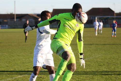 Grays Amadou Tangara (R) and Enfields Bobby Devyne