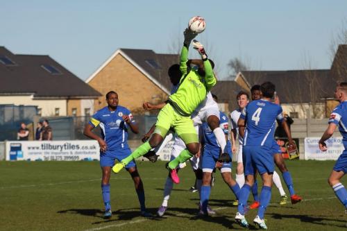 Grays keeper Amadou Tangara is fouled by Harold Joseph