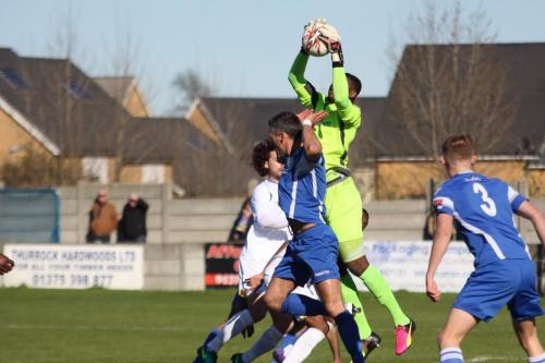Grays keeper Amadou Tangara makes a safe catch