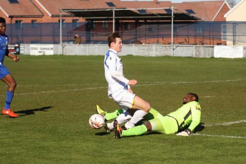 Grays keeper Amadou Tangara saves from Mickey Parcell