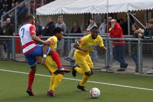 Enfields Dernell Wynter and Ricky Gabriel (R) and Harlows Jared Small