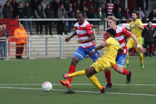 Enfields Dernell Wynter scuffs his shot straight to the keeper