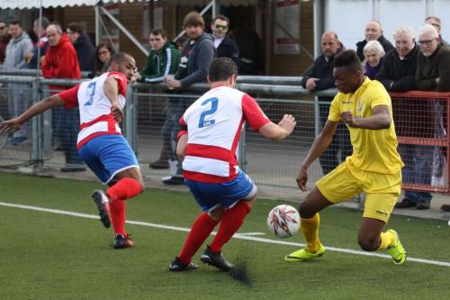 Enfields Karl Oliyide and Harlows Jared Small (L) and Craig Pope