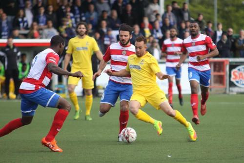 Enfields Scott Shulton (yellow) and Harlows Ibrahima Sonko (L) and Mario Noto