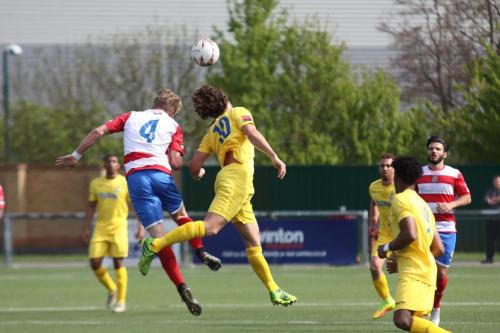 Harlows Charlie Dickens (4) challenges Harry Ottaway