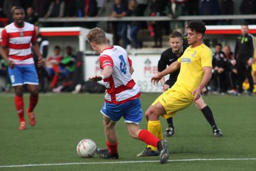 Harlows Charlie Dickens (4) clears from Samir Bihmoutine