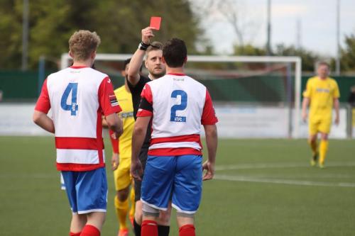 Harlows Craig Pope (2) is sent off