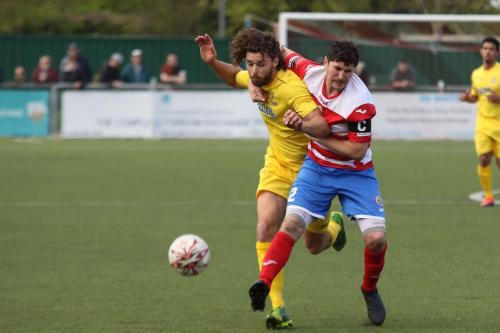 Harlows Craig Pope earns a second yellow card for pulling back Harry Ottaway (yellow)