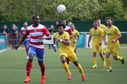 Harlows Ibrahima Sonko (L) under pressure from Dernell Wynter