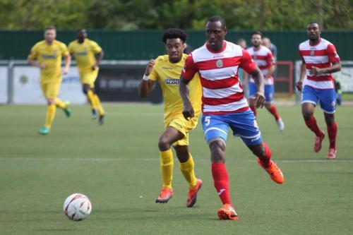 Harlows Ibrahima Sonko (R) under pressure from Dernell Wynter