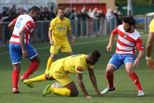 Harlows Stanley Muguo (L) and Mario Noto and Enfields Karl Oliyide