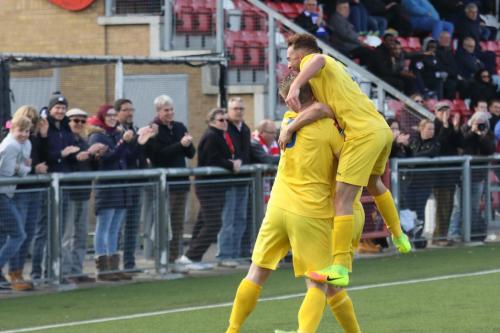 Scott Shulton (R) joins Mark Kirby and Harry Ottaway in the celebrations for the second goal