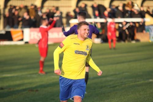 Billy Crook celebrates his goal