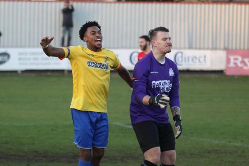 Dernell Wynter (L) celebrates the first of his two goals