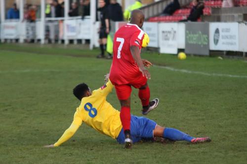 Enfields Nathan Livings (8) challenges Francis Babalola
