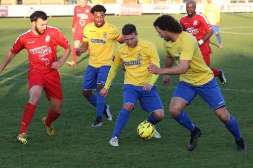 Harrows Andy Lomas (L) finds himself with three players to mark   (L-r) Dernell Wynter, Billy Crook and Harry Ottaway
