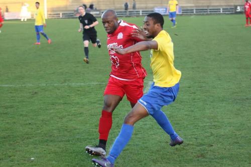 Harrows Francis Babalola (L) and Enfields Ricky Gabriel