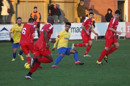 Harrows Joshua Webb (6) takes the ball past Nathan Livings