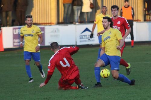 Harrows Steve Brown (4) and Enfields Harry Ottaway
