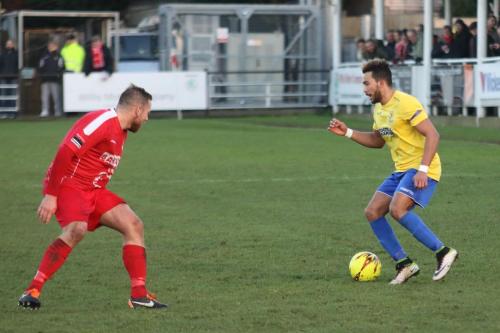 Harrows Steve Brown (L) and Enfields Tyler Campbell
