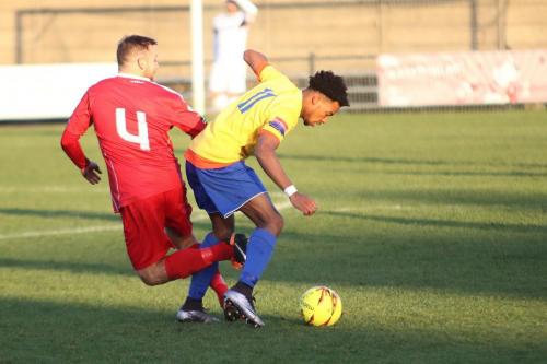Harrows Steve Brown (L) challenges Dernell Wynter